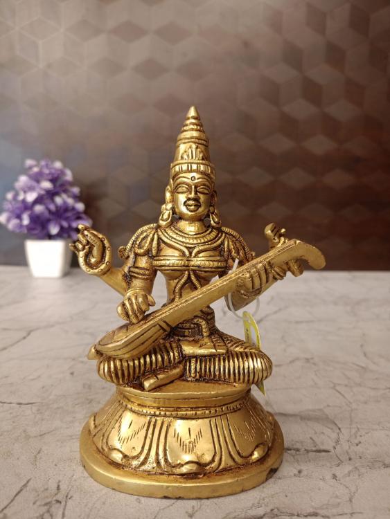 Buy Brass Saraswathi Statue Sitting on Lotus Oval Base 6 Inch